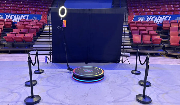 360 photo booth setup at an event for a photo booth marketing guide