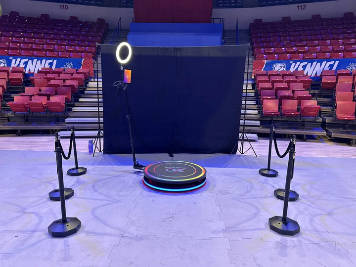 360 photo booth setup at an event for a photo booth marketing guide
