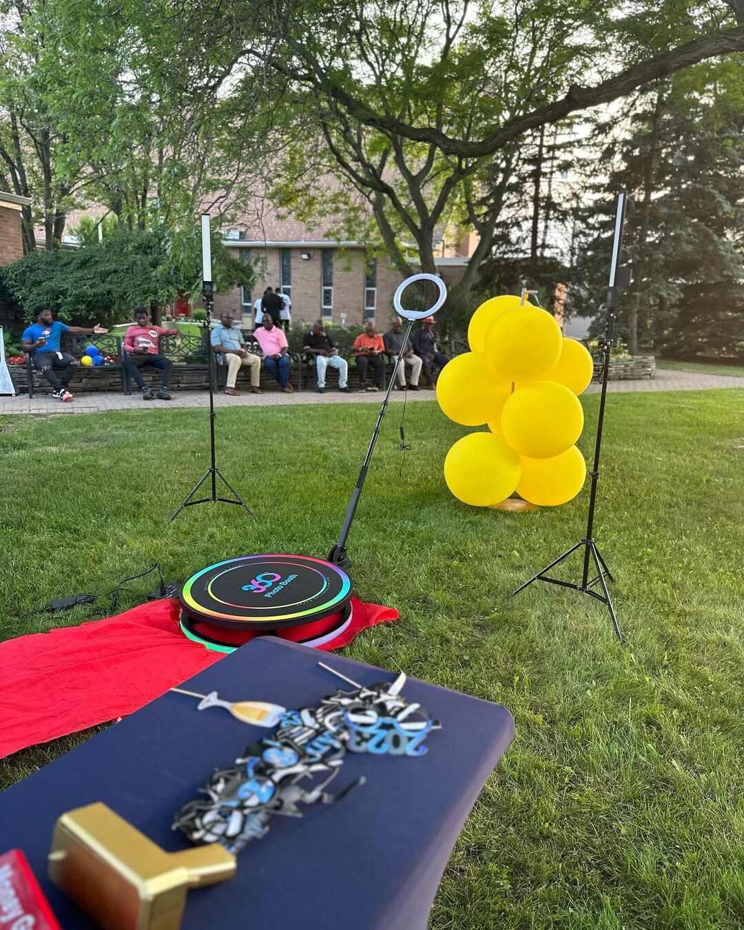 Spin Metal 360 photo booth set up for an outdoor party.