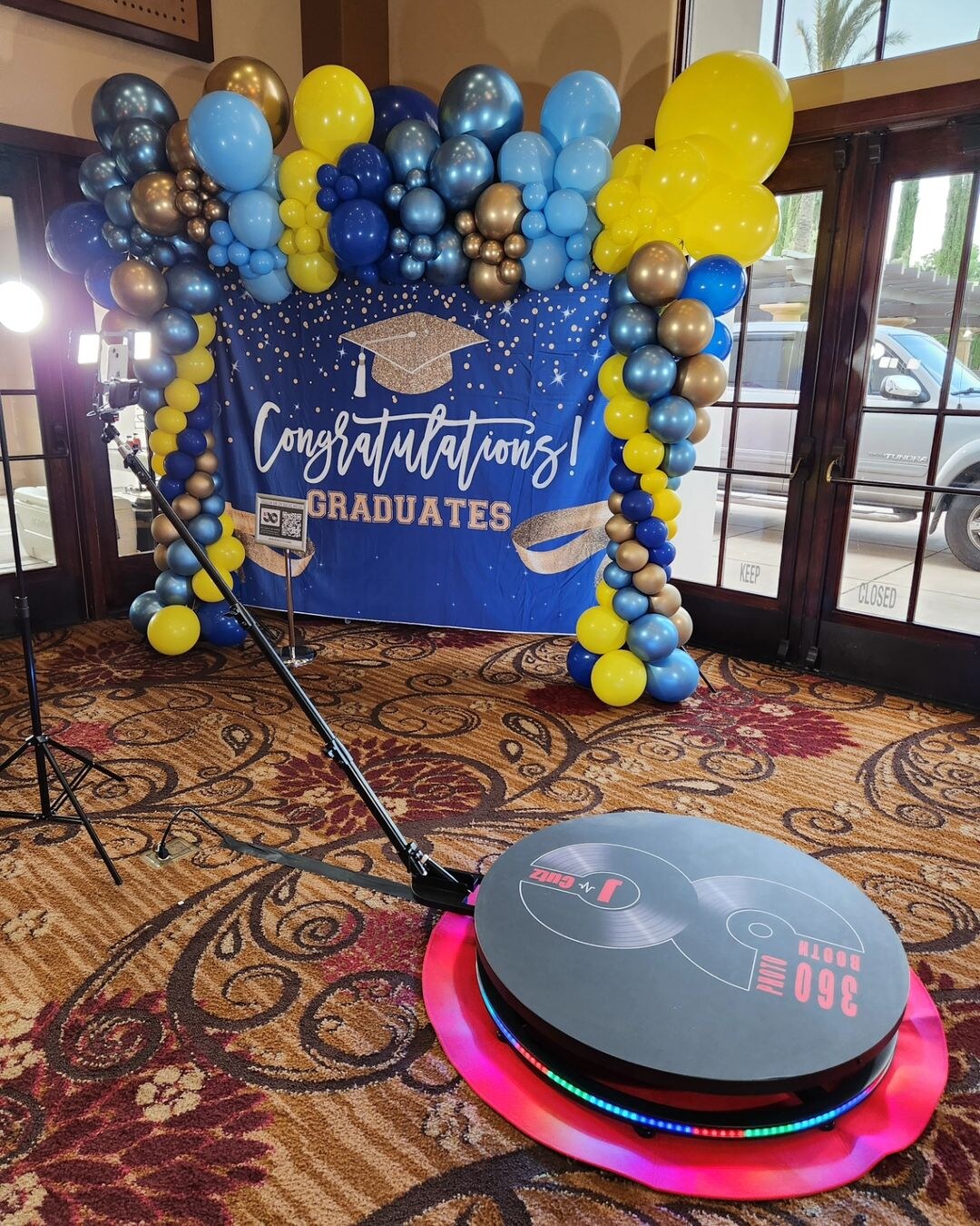 Spin Metal 360 photo booth at a graduation celebration.