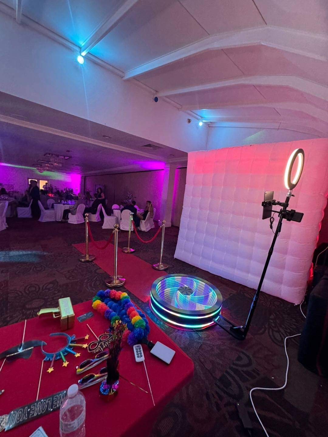 Spin Vortex glass 360 photo booth set up for a wedding reception.
